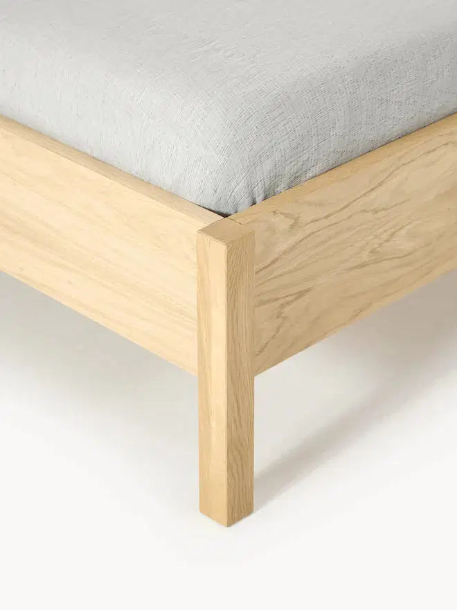 Wooden Bed with Bouclé Headboard